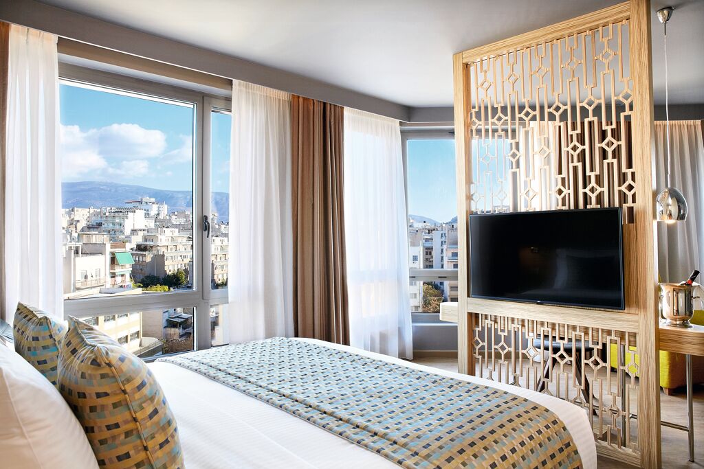 Junior Suite avec vue sur l'Acropole de Wyndham Grand Athens Hôtel 5étoiles situé proche du centre d'Athènes capitale de la Grèce